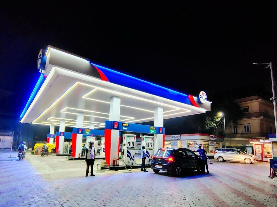 Illuminated Fuel Station — canopy and industrial imagery